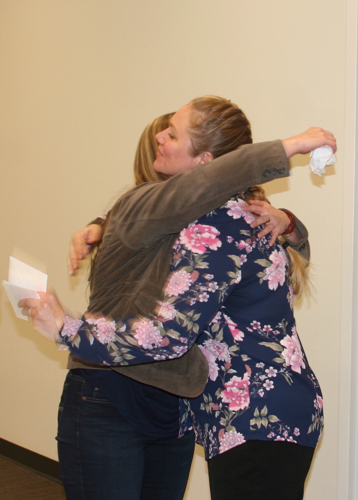 Peer Support Specialists - Allison hugs Brianna
